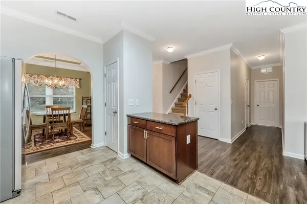 a view of an entryway door and hallway