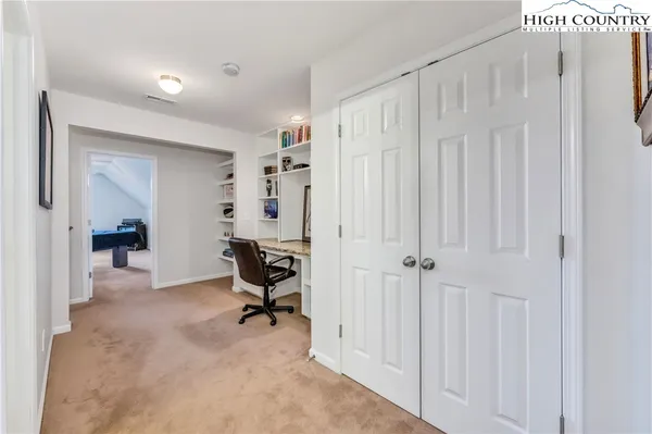 a view of a bedroom with closet area