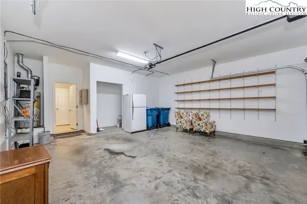 a view of an empty room with a utility room