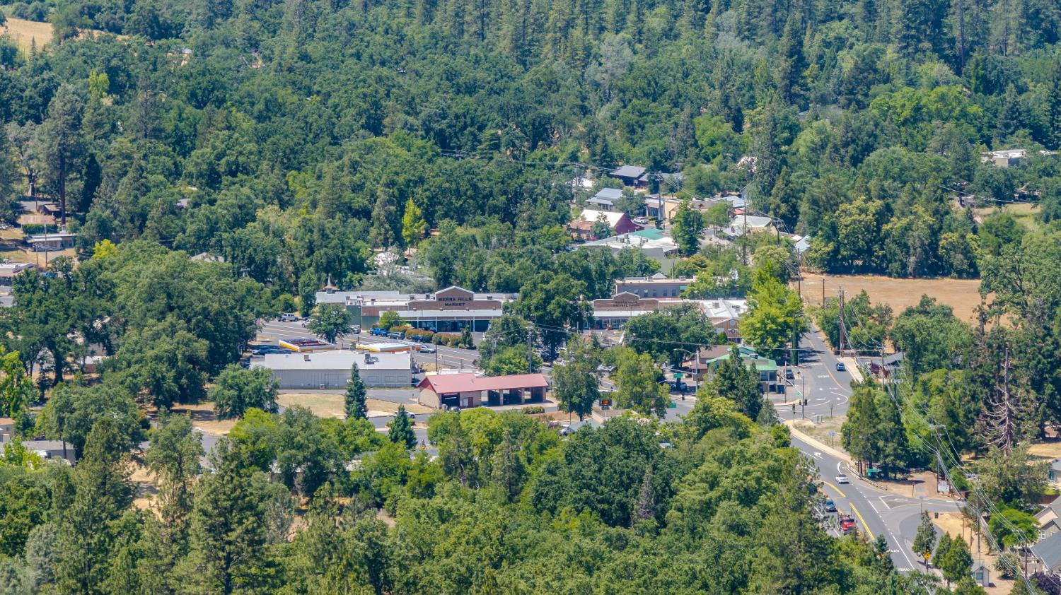 Undisclosed Address Murphys, CA 95247 - Photo 44 of 52 an aerial view of residential house with outdoor space and trees all around