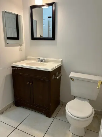 a bathroom with a toilet and a bathtub
