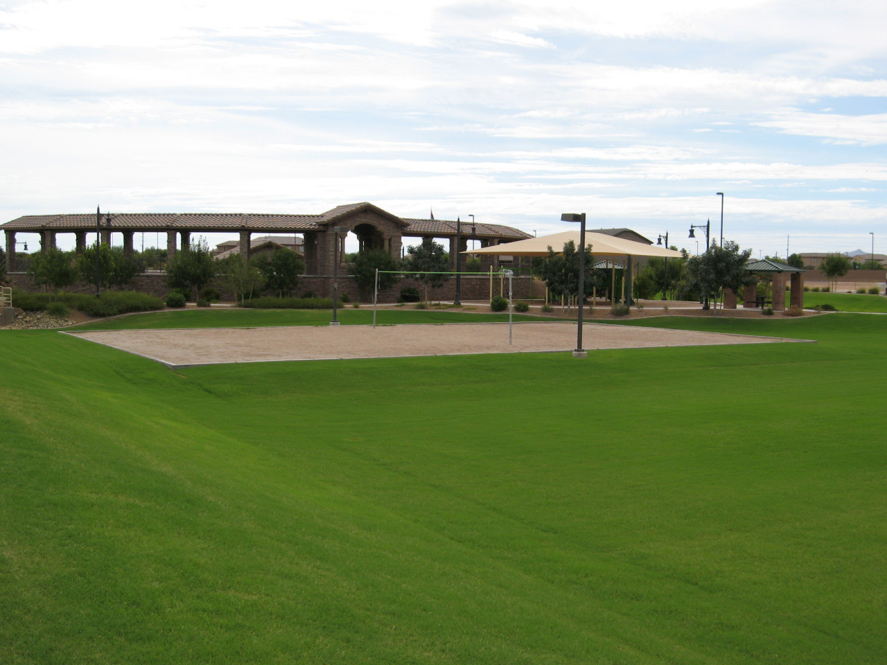 2854 East Blue Sage Road Gilbert, AZ 85297 - Photo 2 of 18 a view of a golf course with a lake