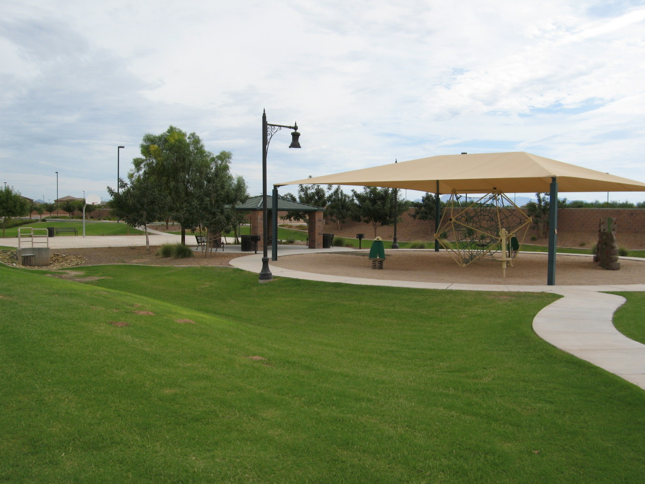 2854 East Blue Sage Road Gilbert, AZ 85297 - Photo 4 of 18 a view of a park with swings
