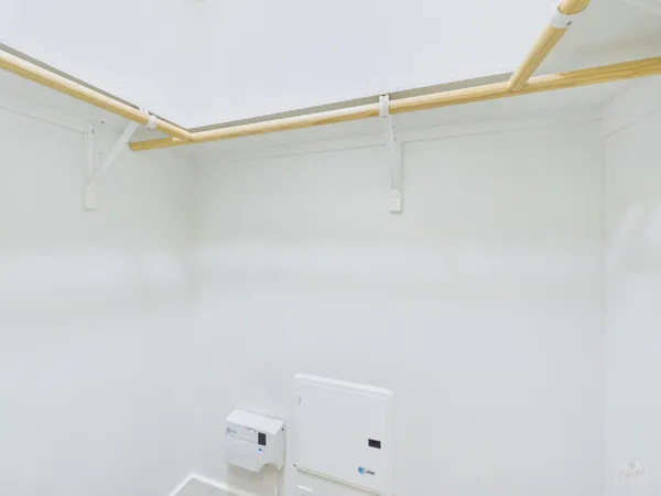 a bathroom with a shower and a toilet in it