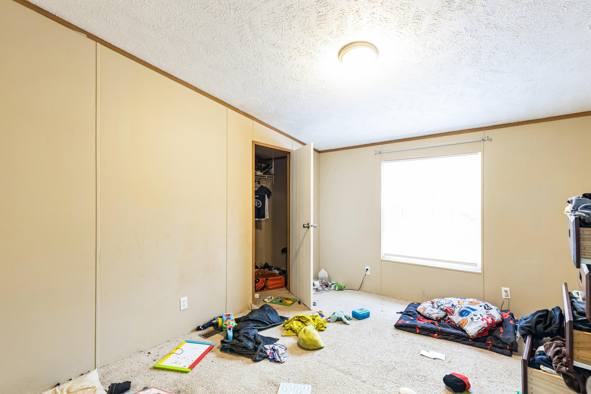 199 Snowden Lane Penhook, VA 24137 - Photo 12 of 15 a bedroom with a bed and a window