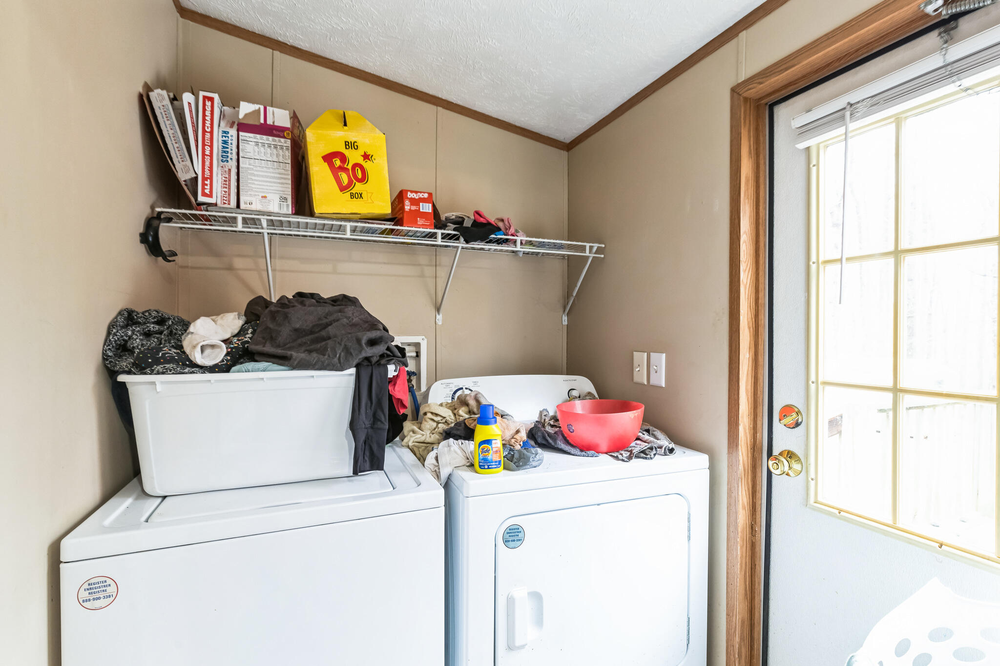 199 Snowden Lane Penhook, VA 24137 - Photo 13 of 15 a utility room with dryer washer and a window