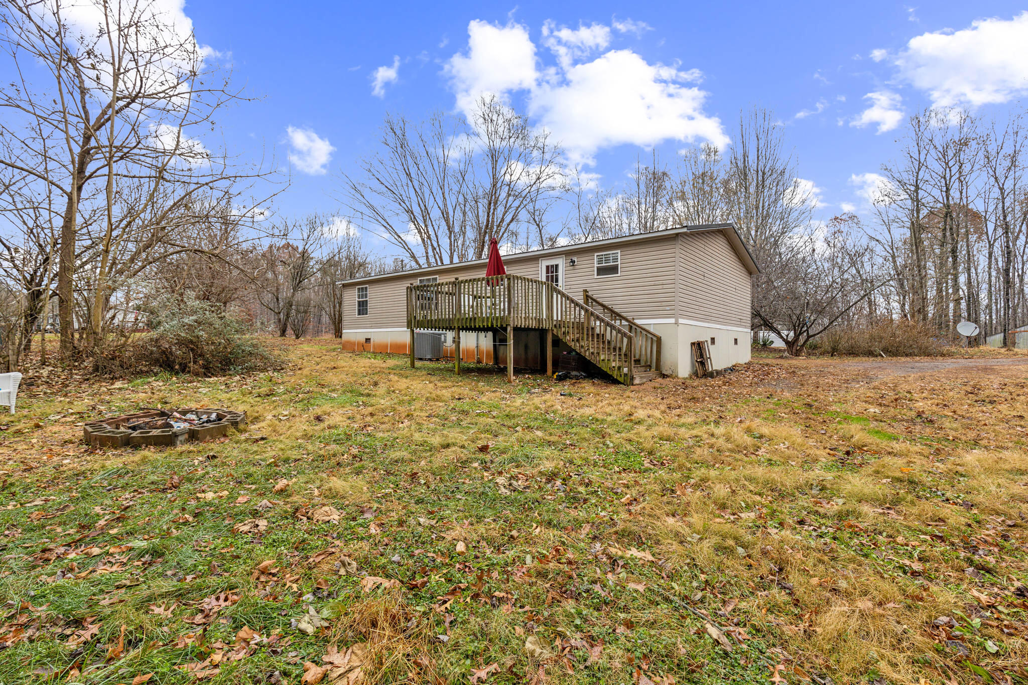 199 Snowden Lane Penhook, VA 24137 - Photo 14 of 15 a view of a house with a snow in a yard