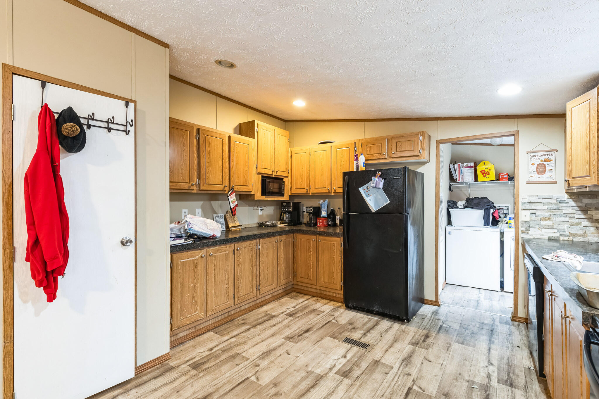 199 Snowden Lane Penhook, VA 24137 - Photo 6 of 15 a kitchen with stainless steel appliances granite countertop a refrigerator and a sink