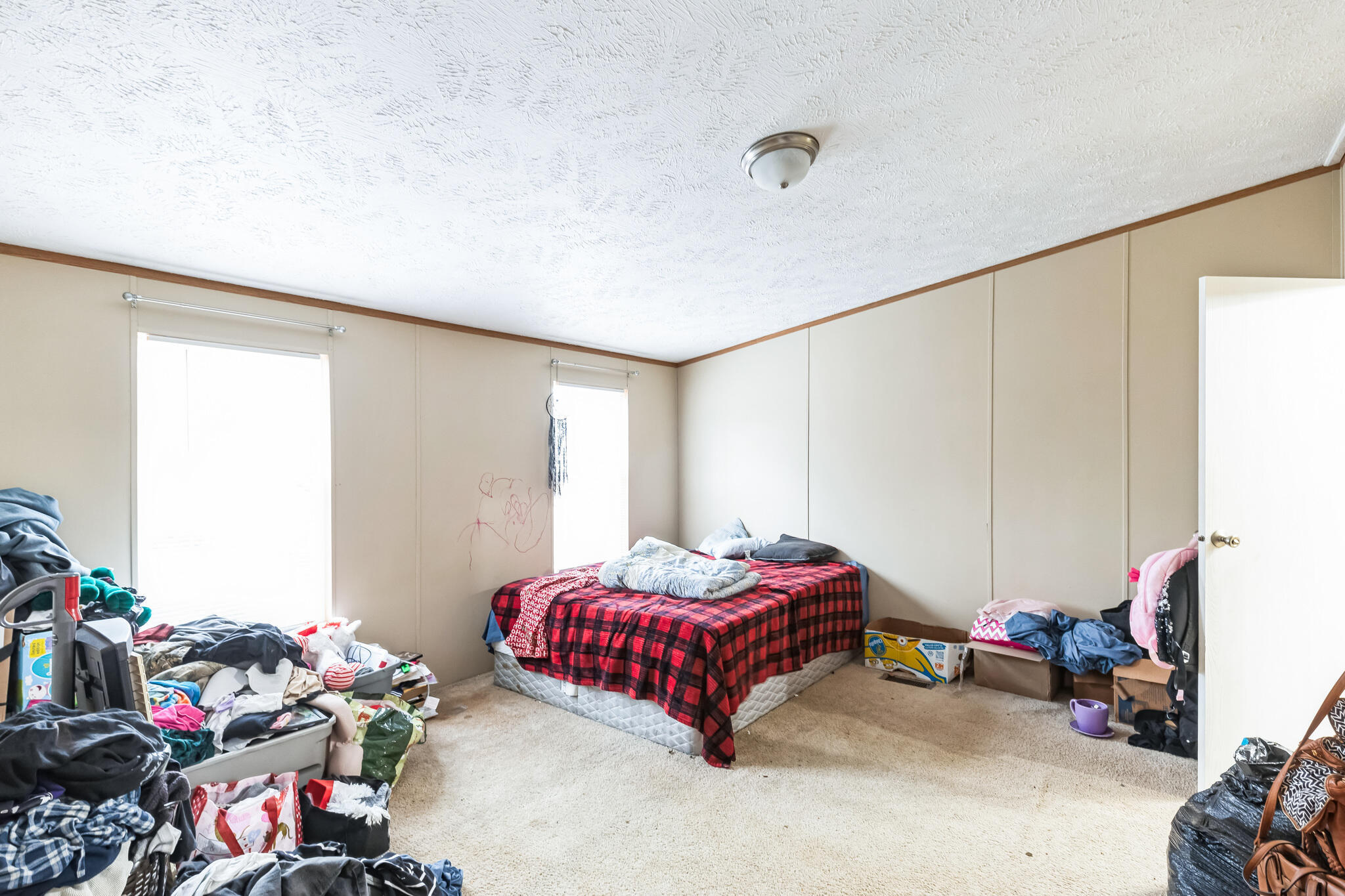 199 Snowden Lane Penhook, VA 24137 - Photo 9 of 15 a bedroom with bed and a window