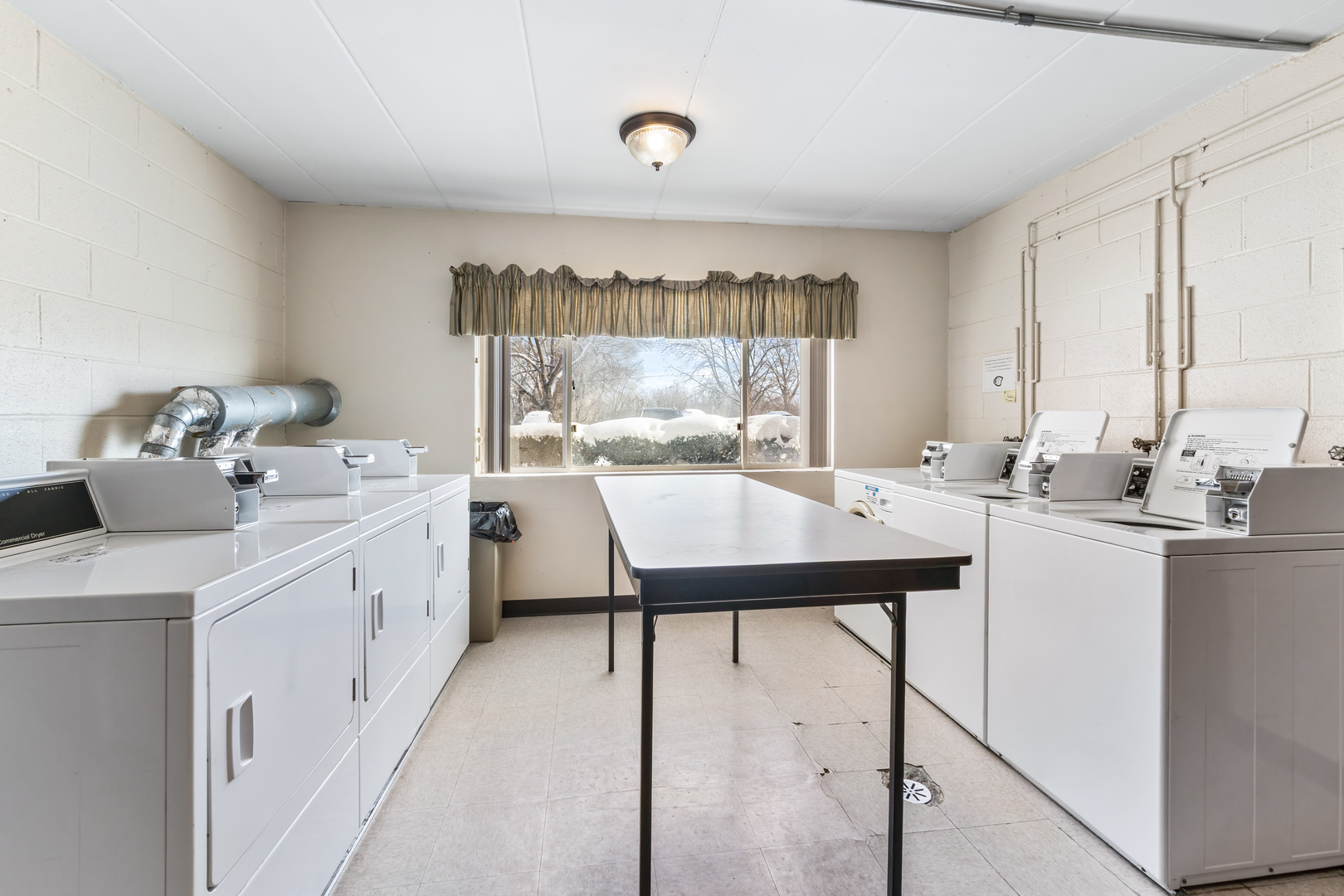 17000 Novak Drive, Unit T105 Hazel Crest, IL 60429 - Photo 12 of 15 a kitchen with a sink cabinets and wooden floor