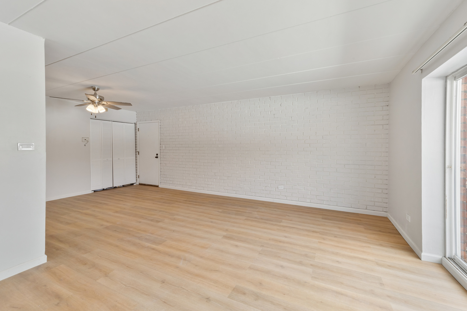 17000 Novak Drive, Unit T105 Hazel Crest, IL 60429 - Photo 2 of 15 wooden floor in an empty room