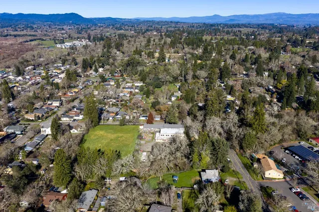 an aerial view of residential house with outdoor space