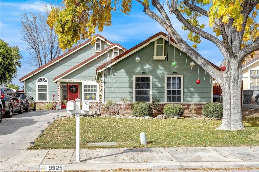 9925 Rhinelander Drive Riverside, CA 92503 - Photo 1 of 1 a front view of a house with garden
