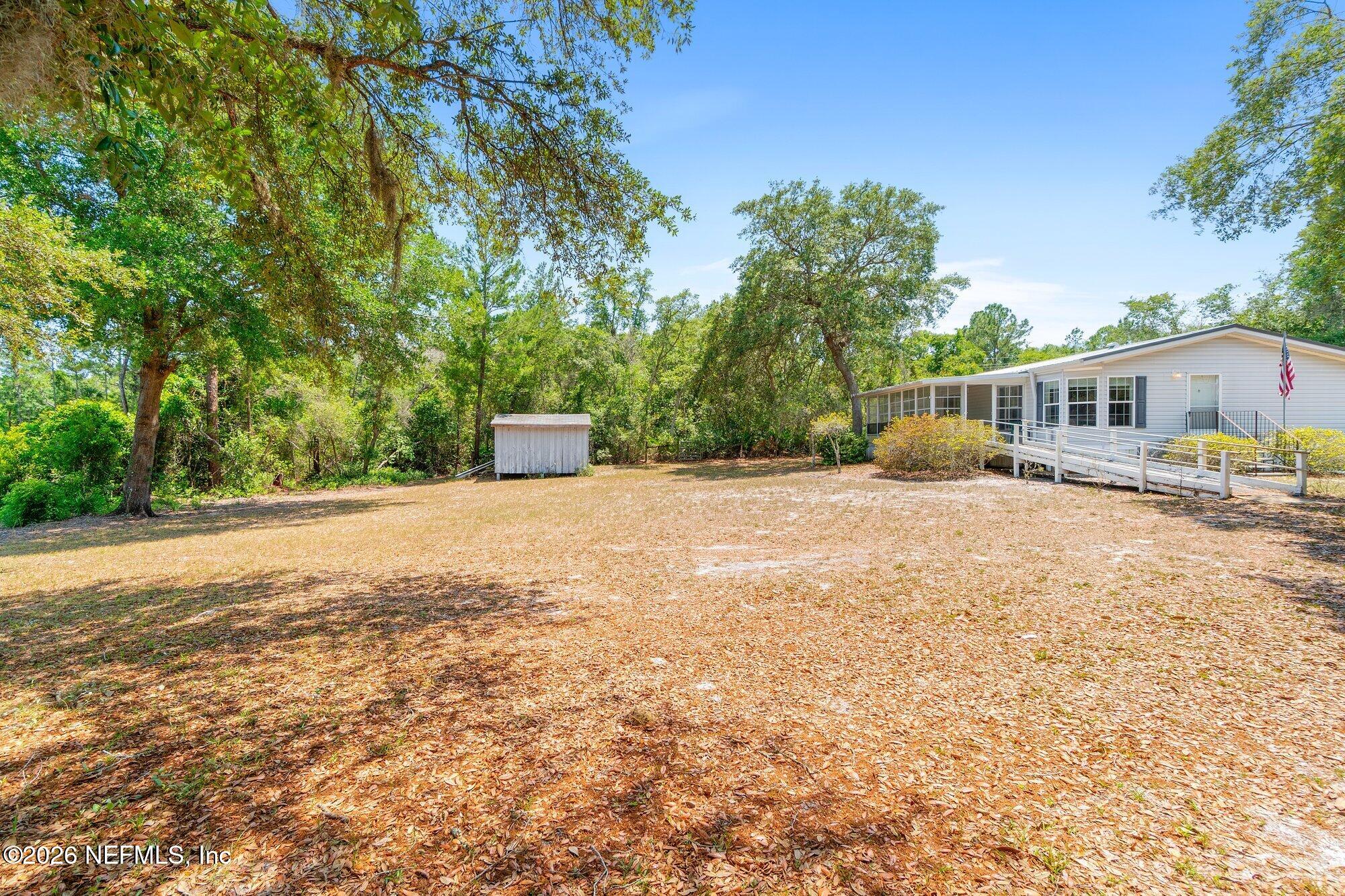 100 Mcgrady Lake Road Crescent City, FL 32112 - Photo 35 of 59 Backyard/Shed