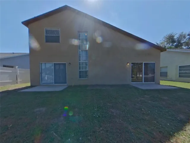 a house view with a garden space