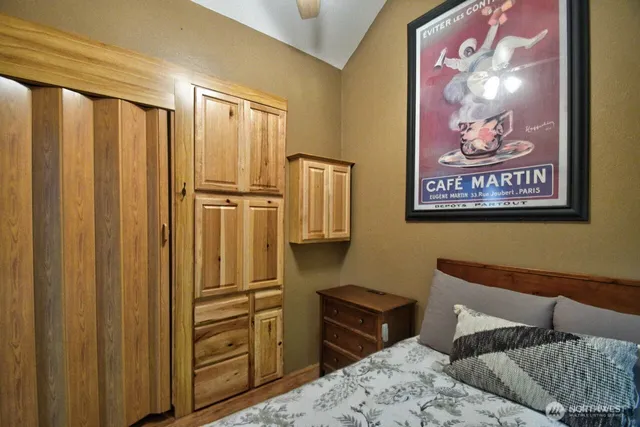 a bedroom with a bed and furniture