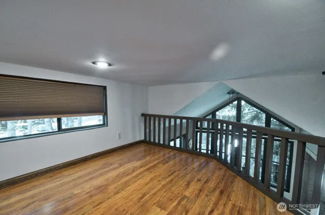 a view of hallway with a window