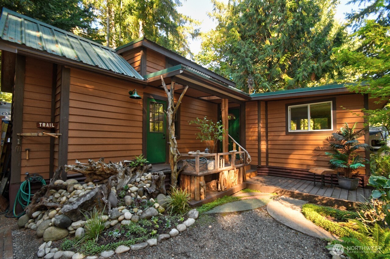 1546 Reservation Road Southeast, Unit 183 Olympia, WA 98513 - Photo 2 of 38 a backyard of a house with lots of green space