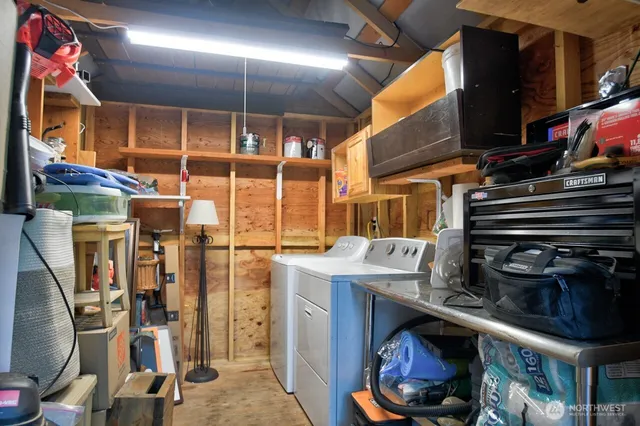 a kitchen with a stove and a refrigerator