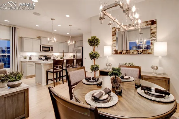 a kitchen with a sink and stove