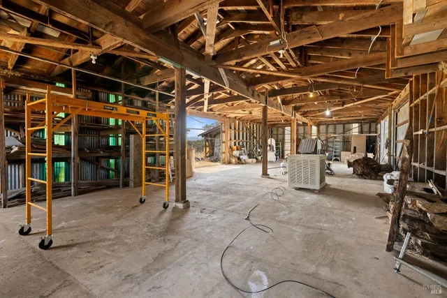 a view of a car park in front of house