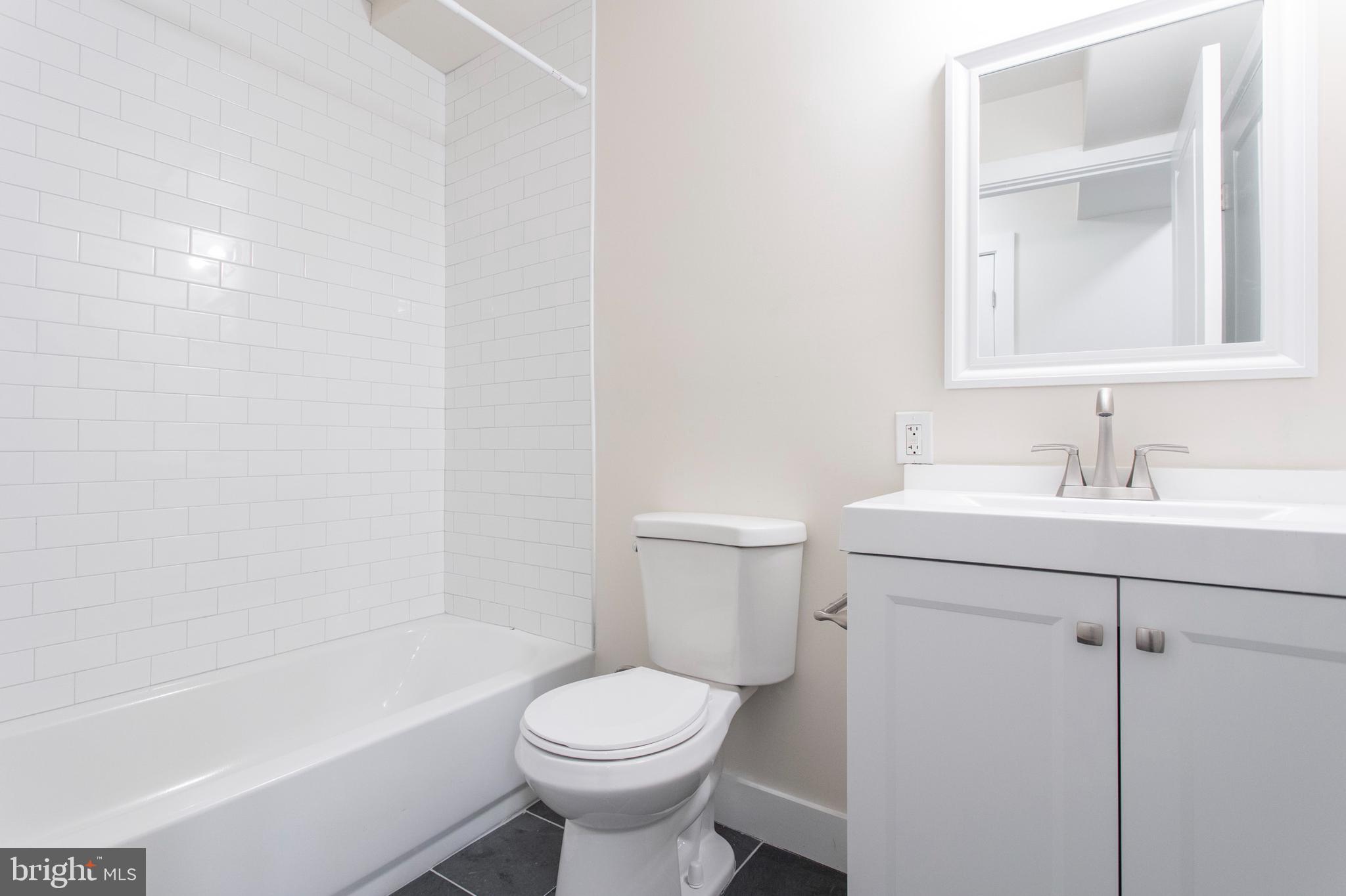 767 South 15th Street Philadelphia, PA 19146 - Photo 18 of 69 a bathroom with a sink toilet and shower