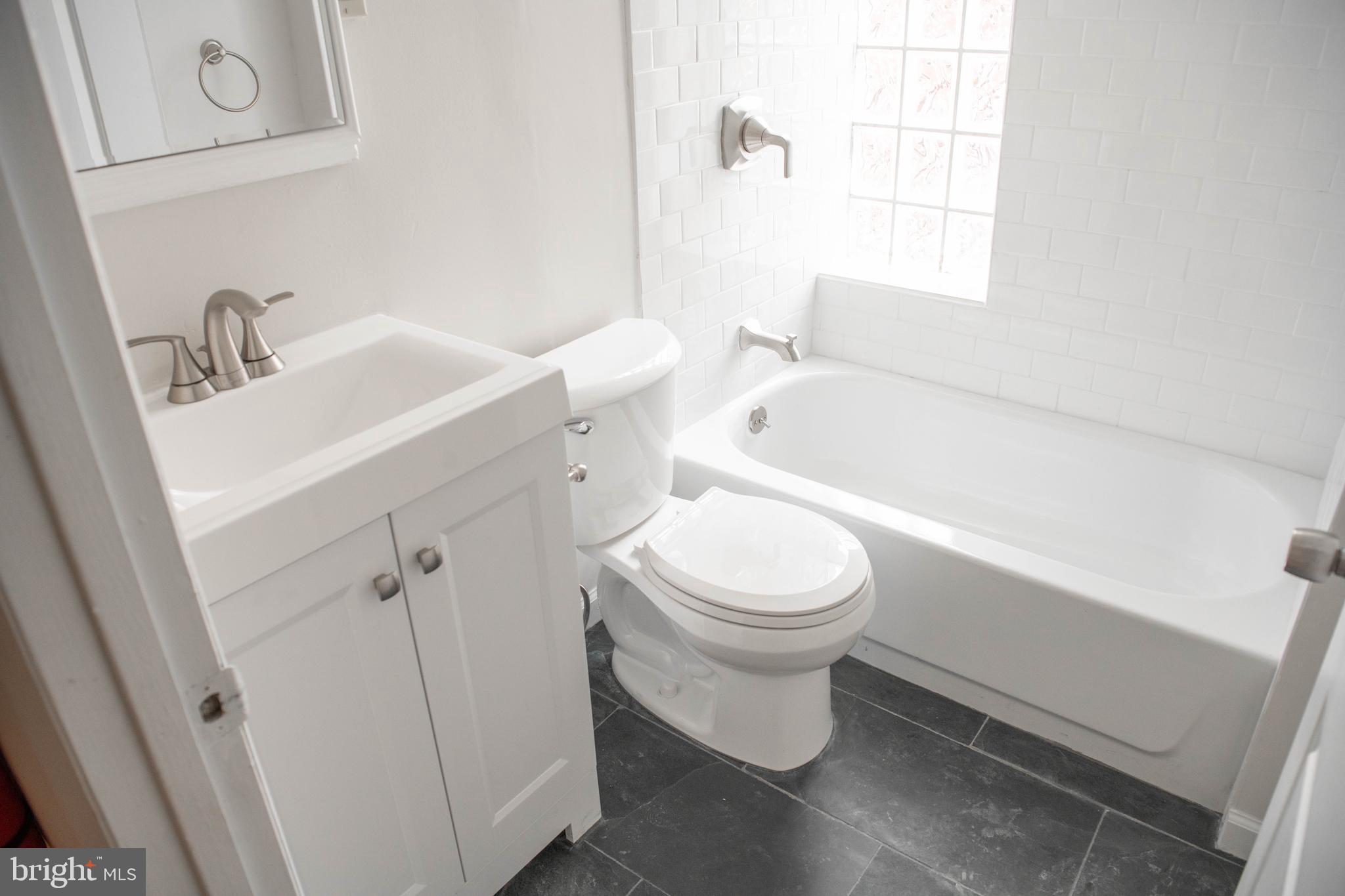 767 South 15th Street Philadelphia, PA 19146 - Photo 34 of 69 a bathroom with a sink toilet and shower