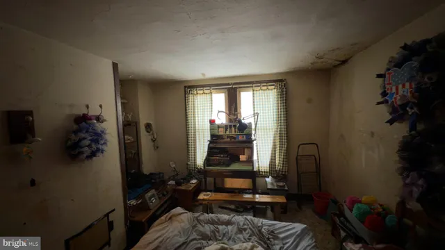 a room with furniture and wooden floor