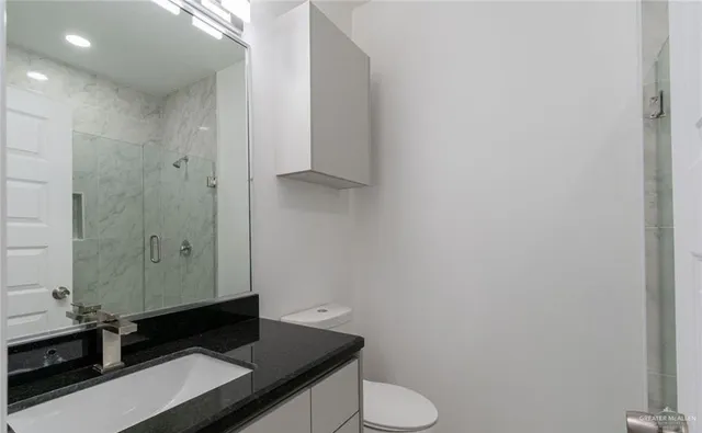 a bathroom with a sink and a toilet