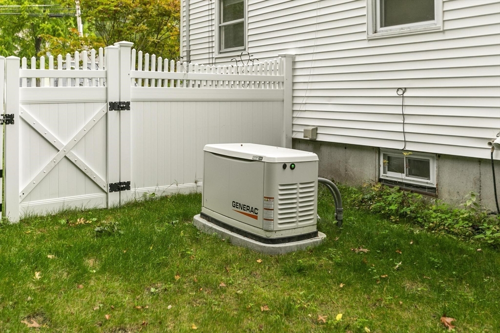 49 Baldwin Road Billerica, MA 01821 - Photo 35 of 42 a view of a house with a yard and deck