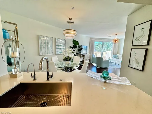 a bathroom with a sink double vanity and a mirror