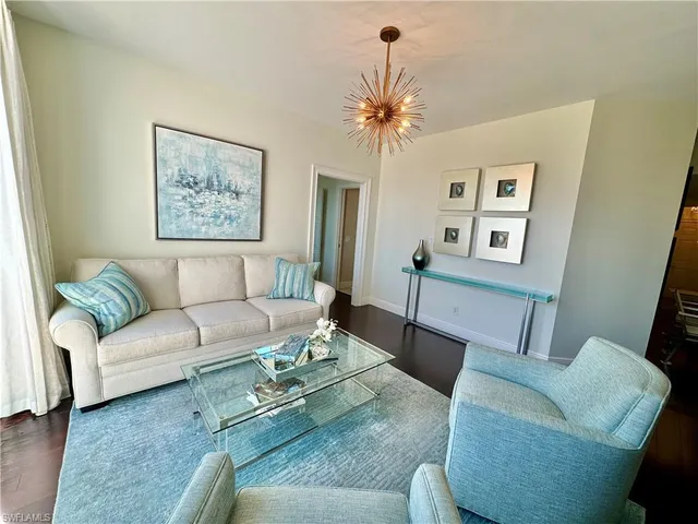 a living room with furniture and a couch