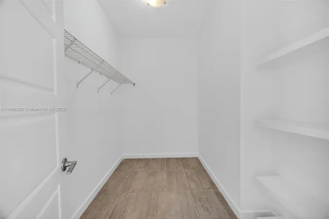 a view of a room with racks on the wall