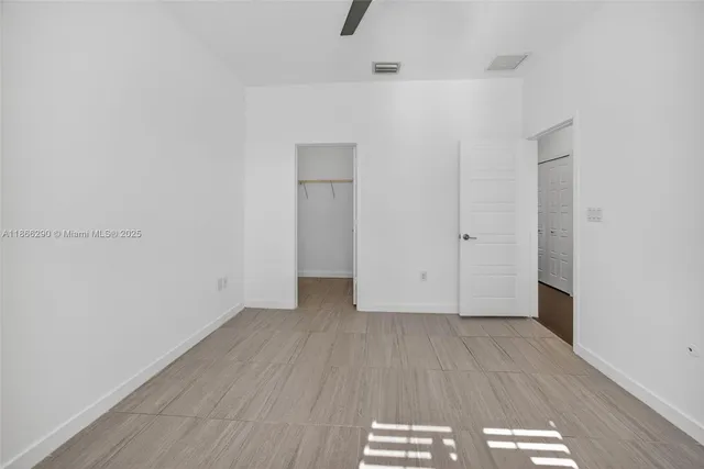 a view of a livingroom with wooden floor