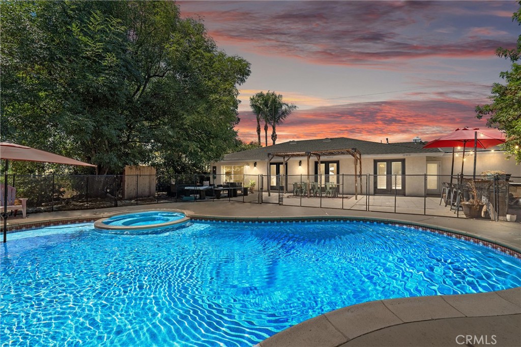 5621 Turquoise Avenue Rancho Cucamonga, CA 91701 - Photo 1 of 1 a view of swimming pool with lawn chairs and plants