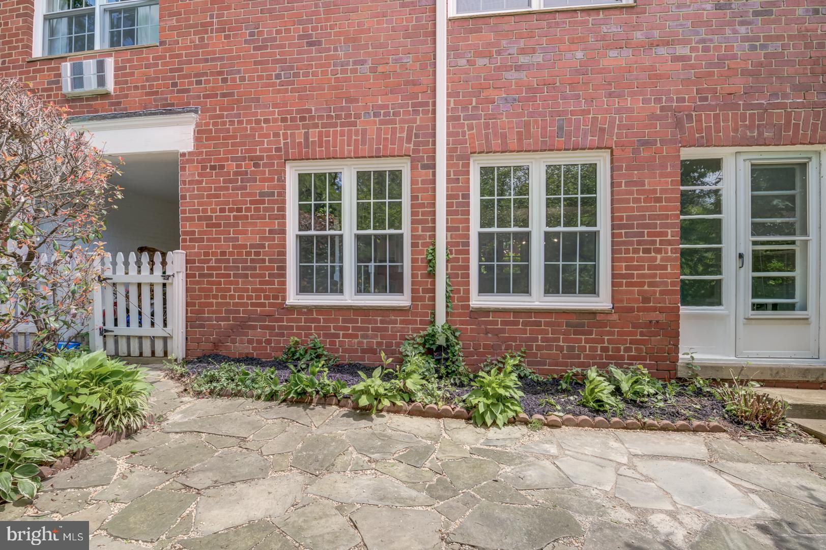 1628 Mt Eagle Place Alexandria, VA 22302 - Photo 33 of 41 a front view of a brick house many windows