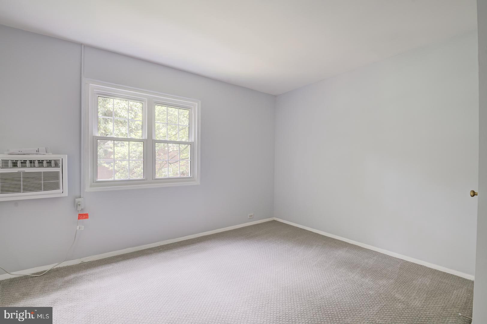 1628 Mt Eagle Place Alexandria, VA 22302 - Photo 4 of 41 an empty room with a window