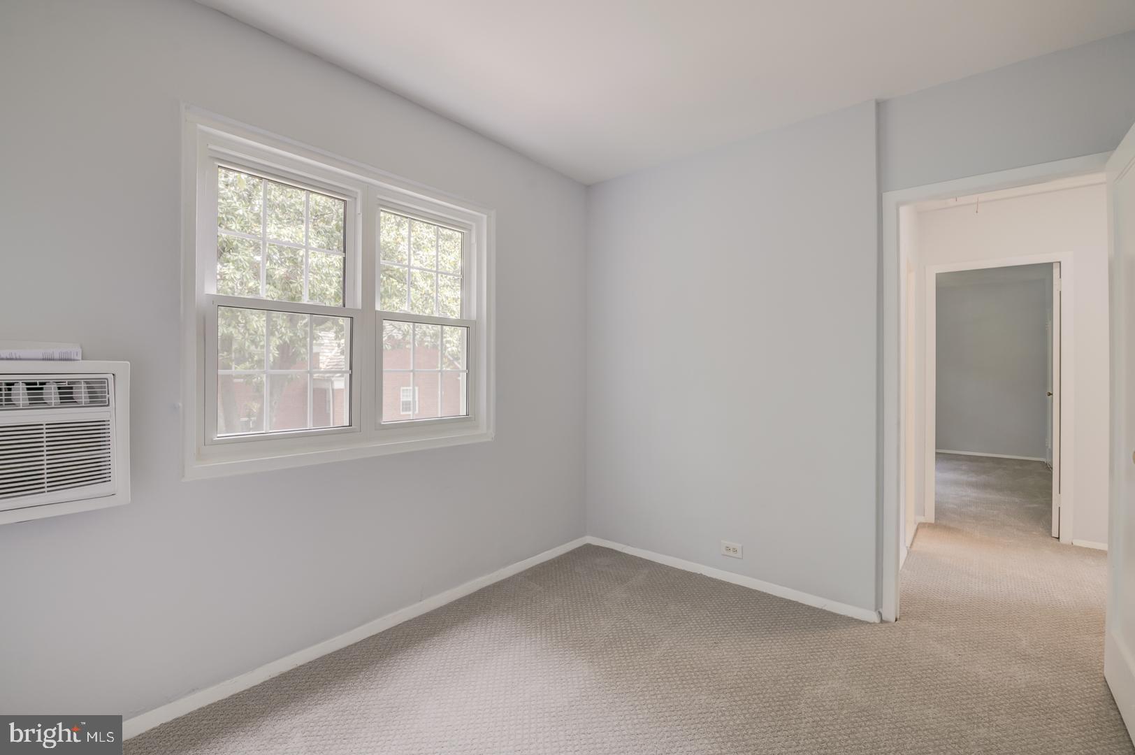 1628 Mt Eagle Place Alexandria, VA 22302 - Photo 6 of 41 an empty room with windows