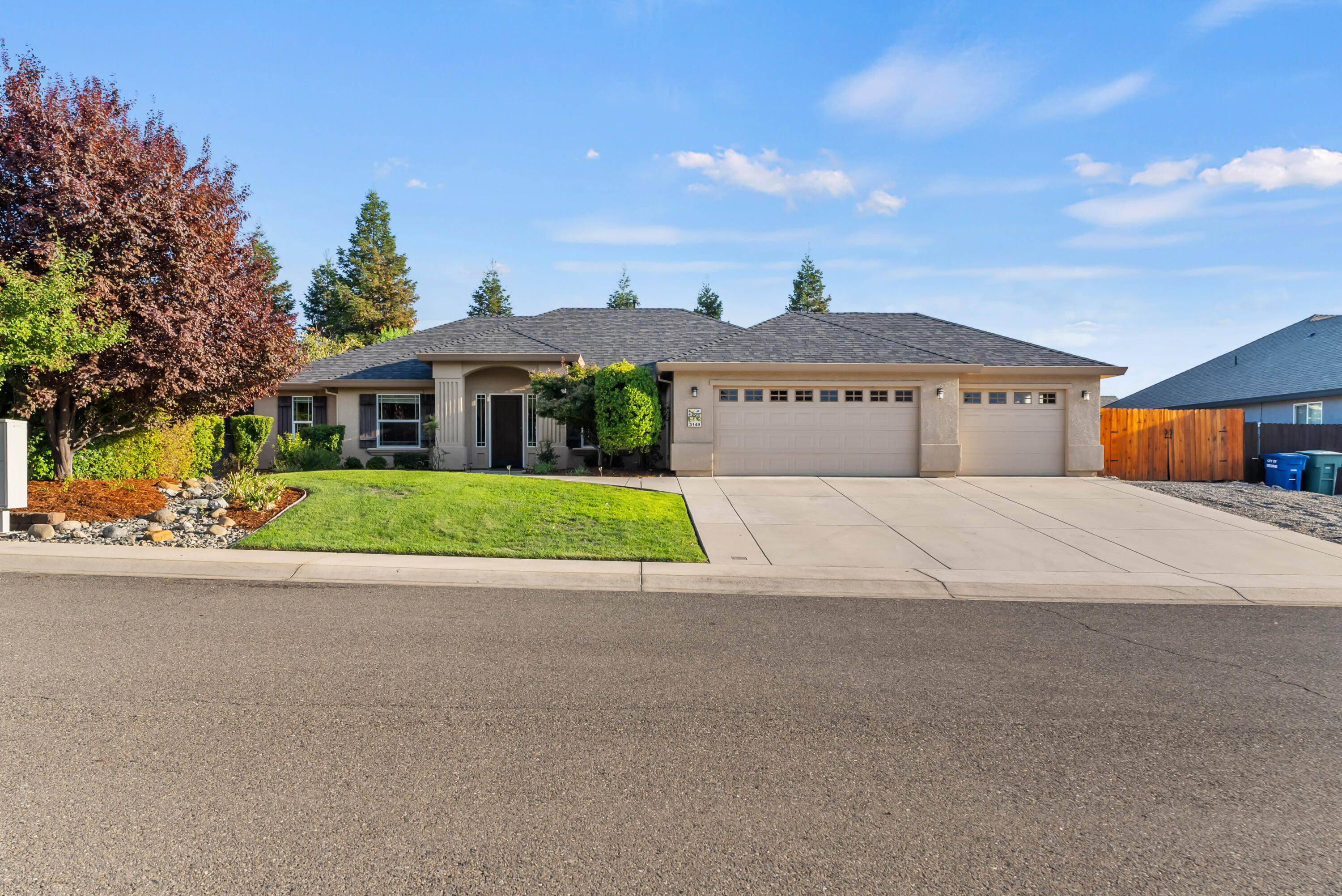 a view of house with yard