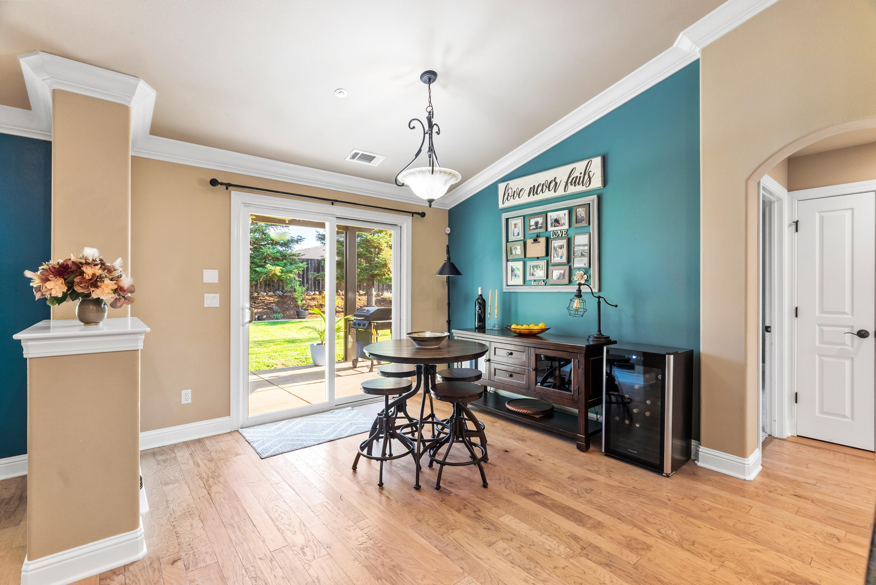 3149 Laver Street Redding, CA 96002 - Photo 16 of 40 a living room with furniture and a wooden floor