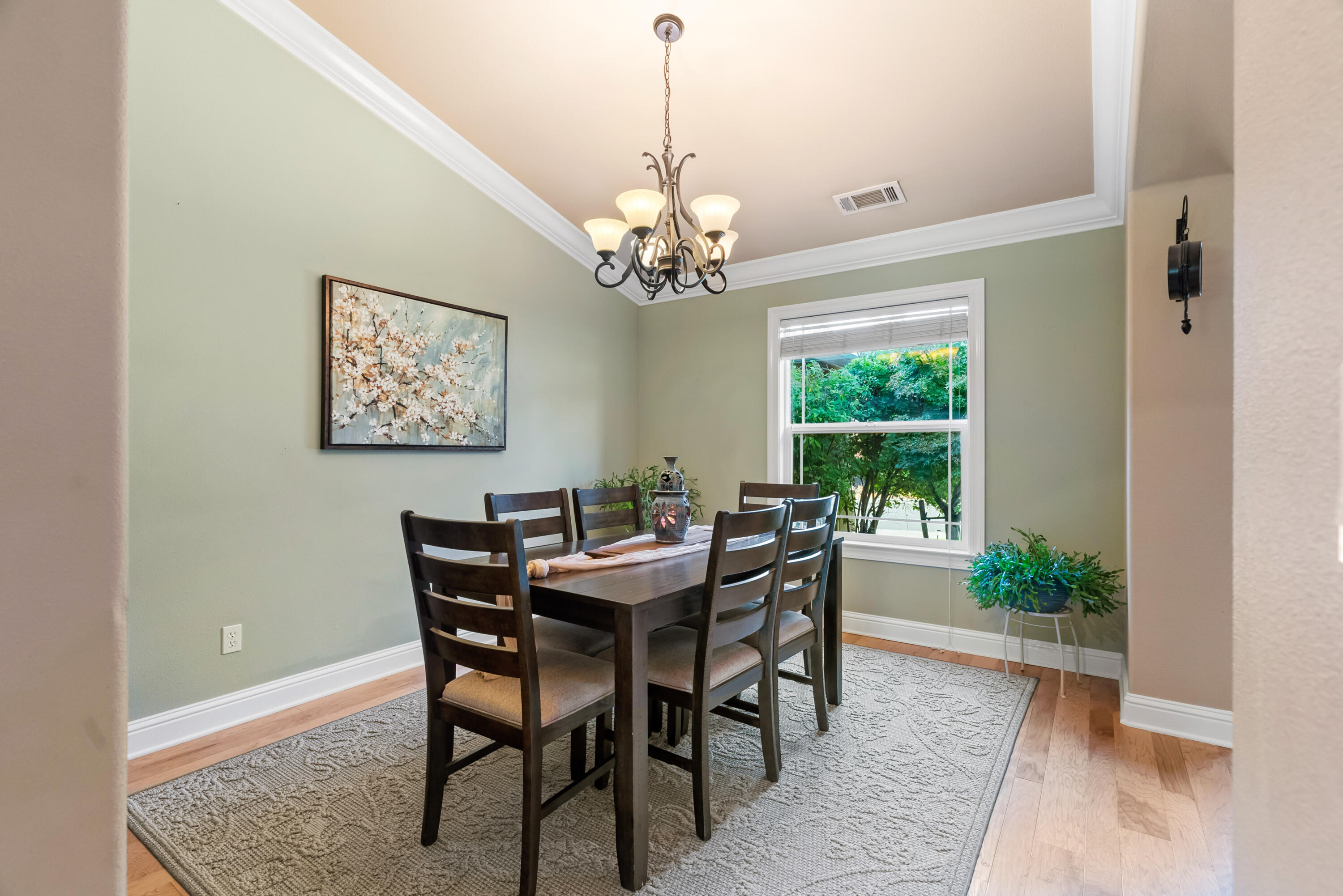 3149 Laver Street Redding, CA 96002 - Photo 18 of 40 a view of a dining room with furniture window and outside view