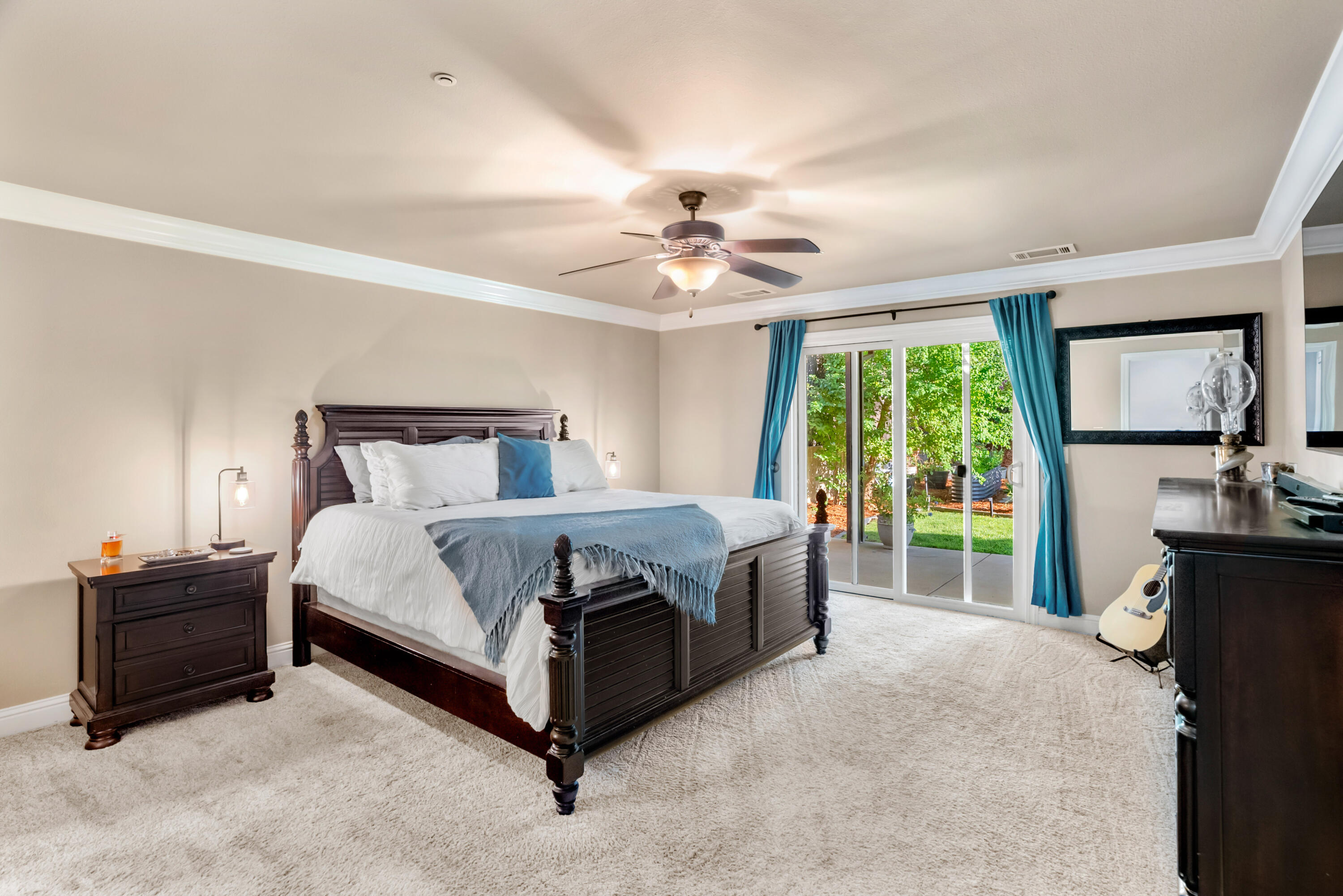 3149 Laver Street Redding, CA 96002 - Photo 19 of 40 a bed sitting in a spacious bedroom next to a window