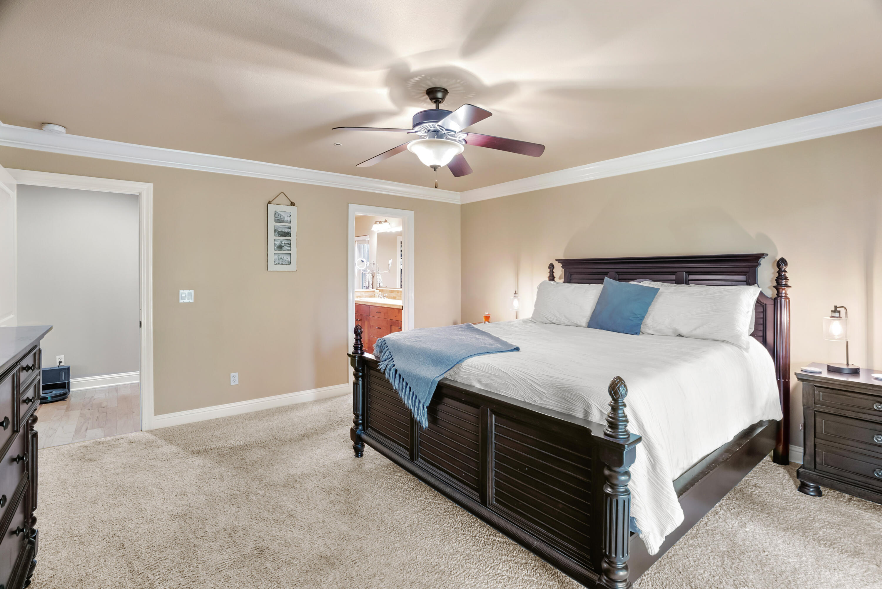 3149 Laver Street Redding, CA 96002 - Photo 20 of 40 a bedroom with a bed and a ceiling fan