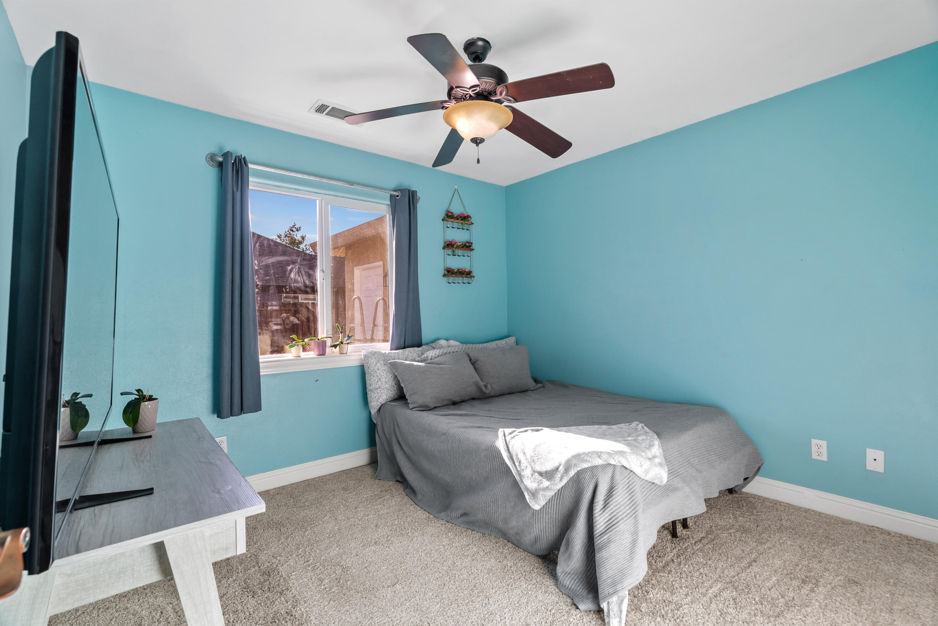 3149 Laver Street Redding, CA 96002 - Photo 29 of 40 a bed sitting in a bedroom next to a window