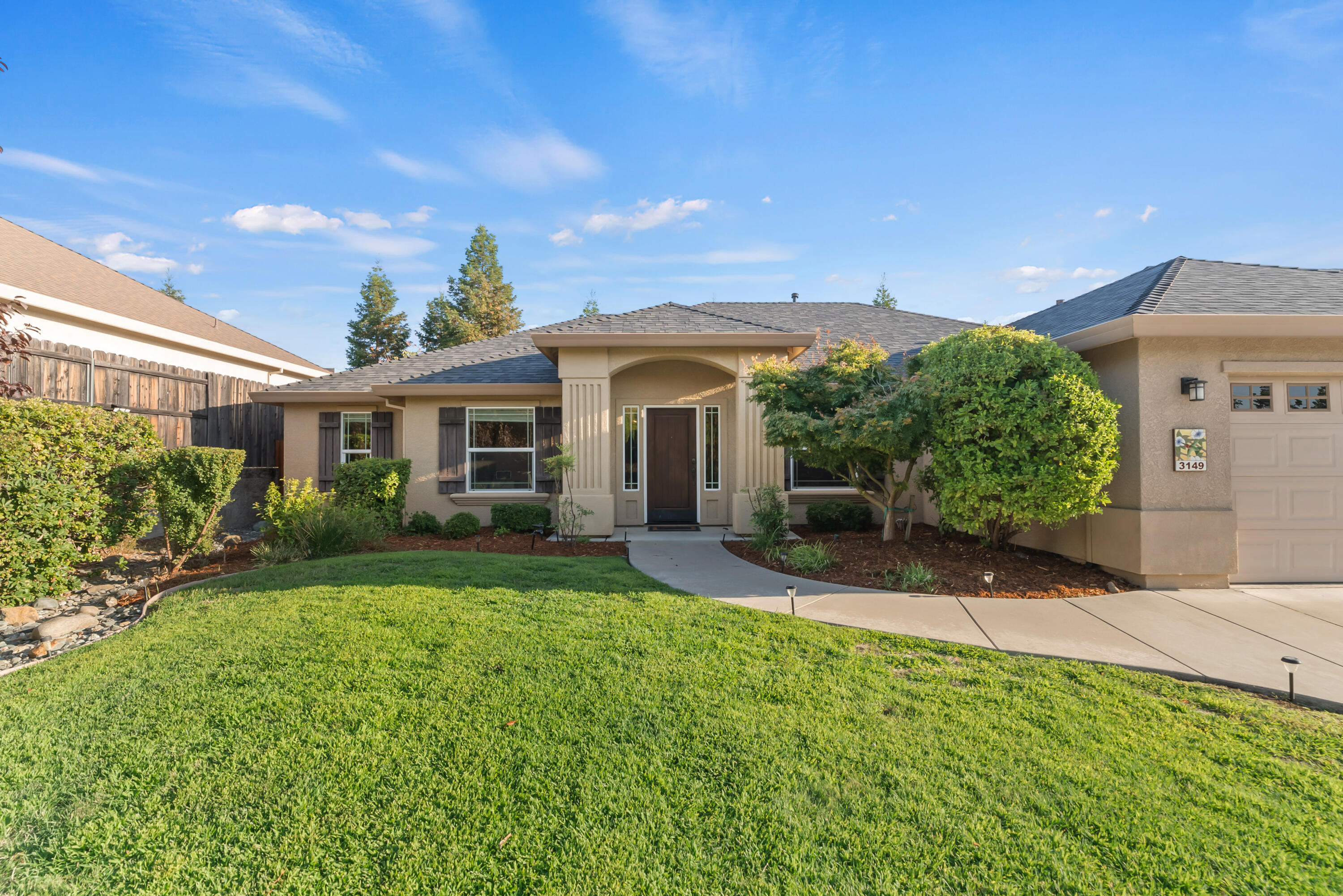 3149 Laver Street Redding, CA 96002 - Photo 3 of 40 front view of a house with a yard