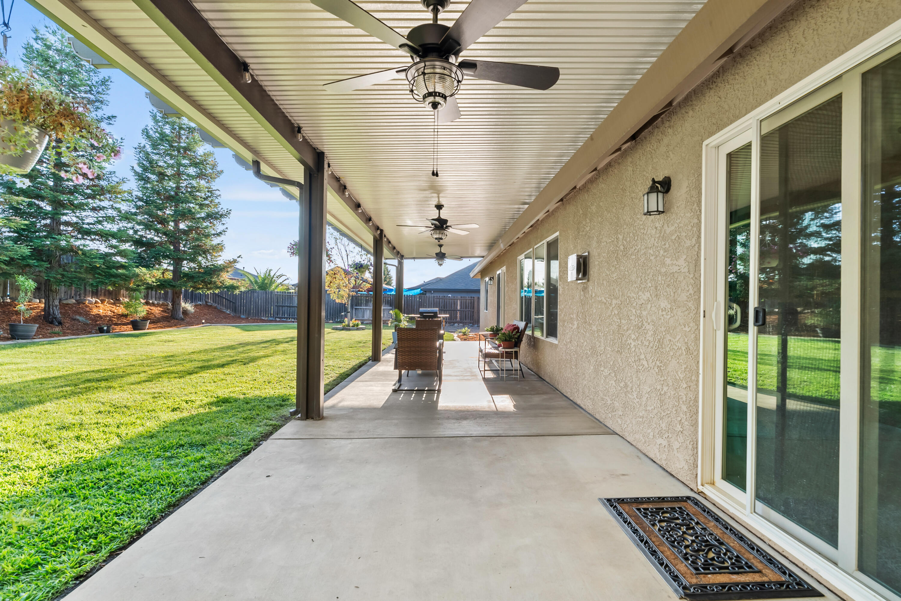 3149 Laver Street Redding, CA 96002 - Photo 34 of 40 a view of a patio with a table and chairs