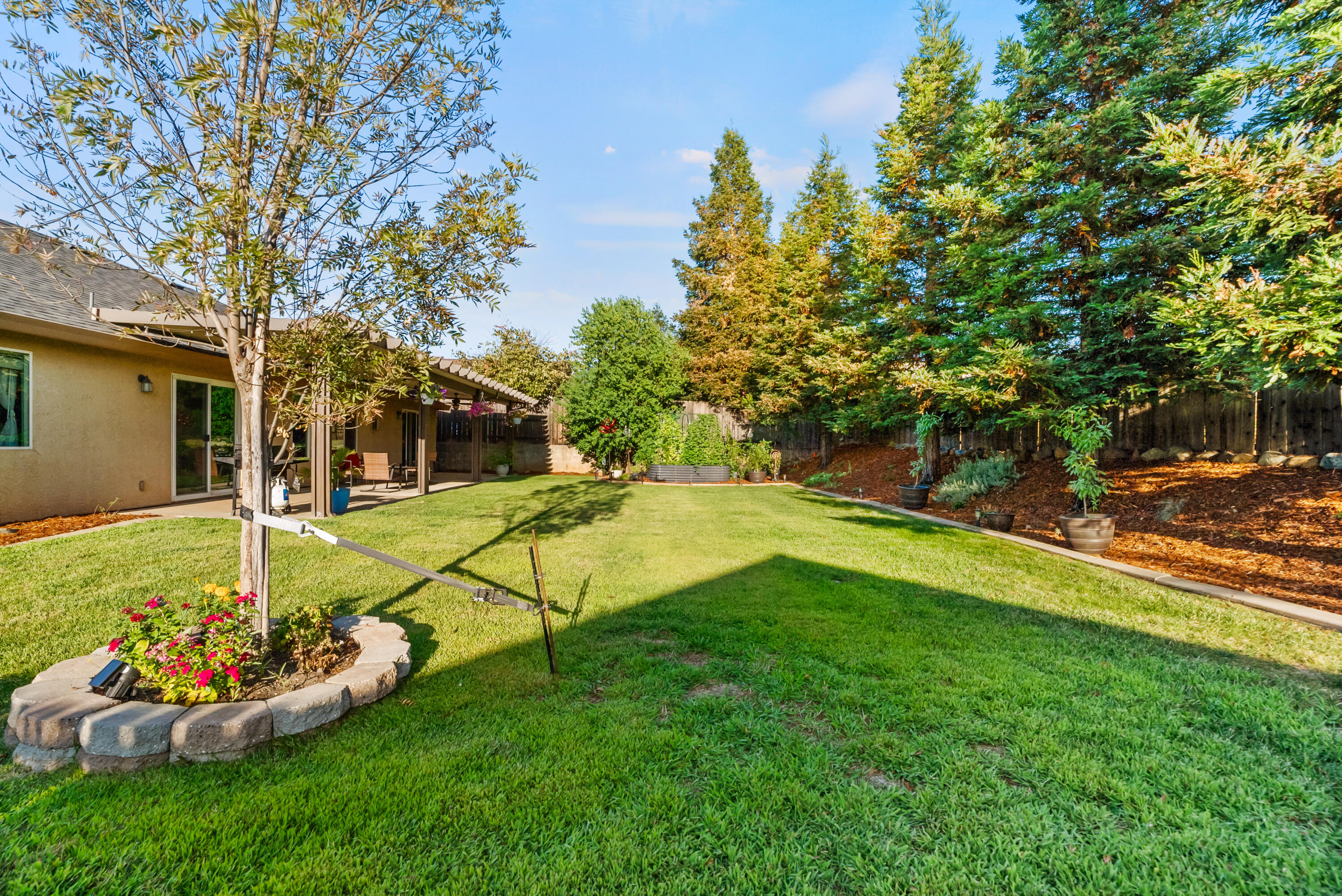 3149 Laver Street Redding, CA 96002 - Photo 38 of 40 a view of a backyard with swimming pool