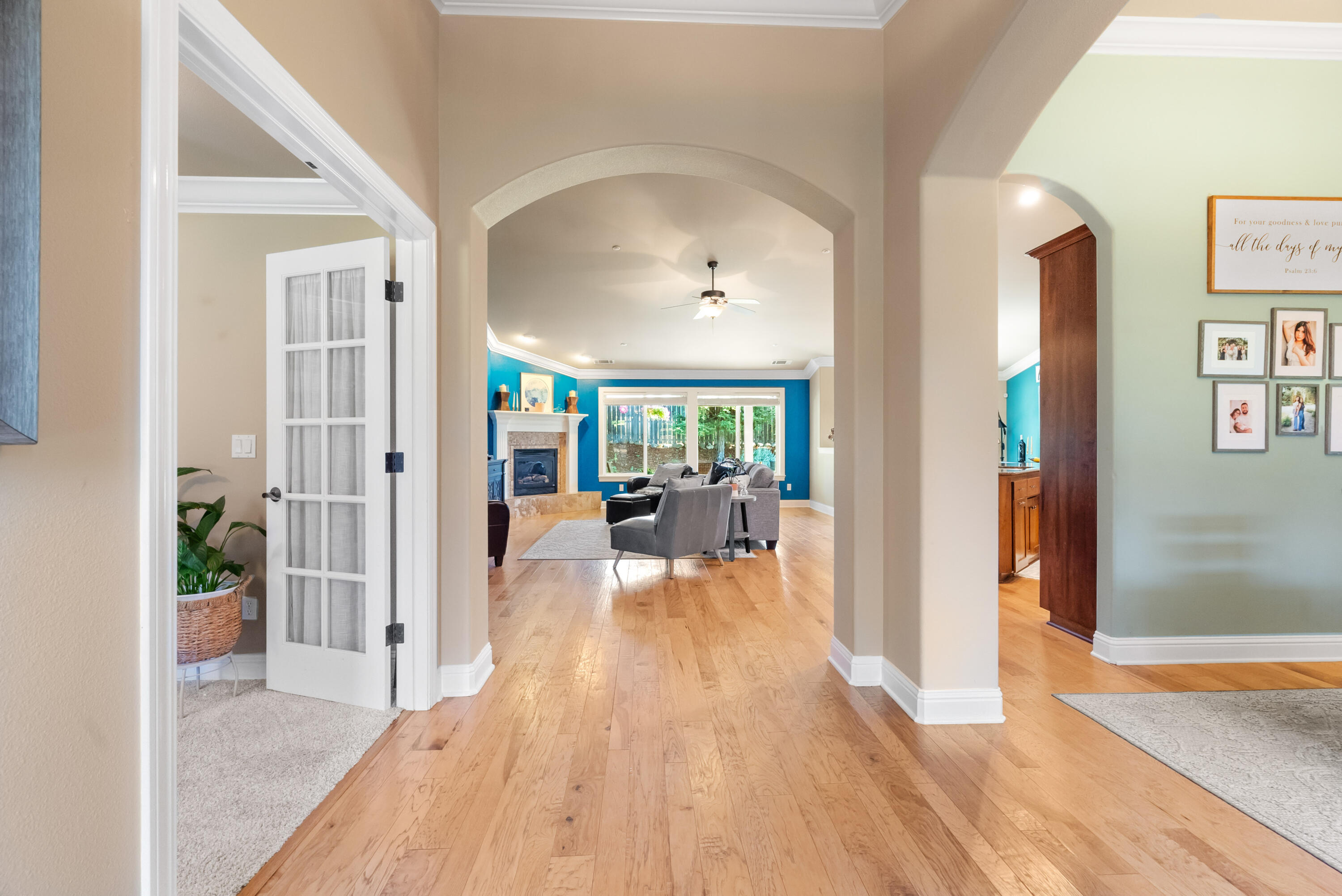 3149 Laver Street Redding, CA 96002 - Photo 5 of 40 a view of a living room and a wooden floor