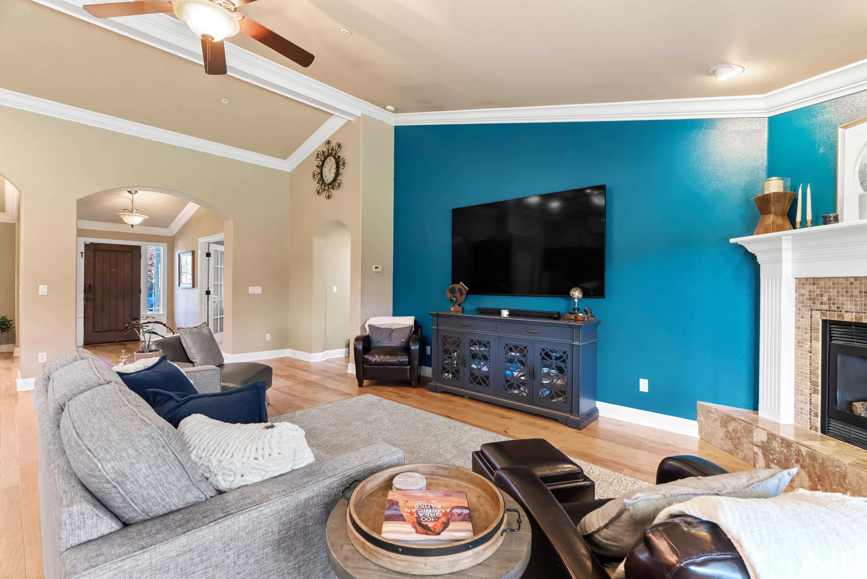 3149 Laver Street Redding, CA 96002 - Photo 9 of 40 a living room with furniture and a flat screen tv