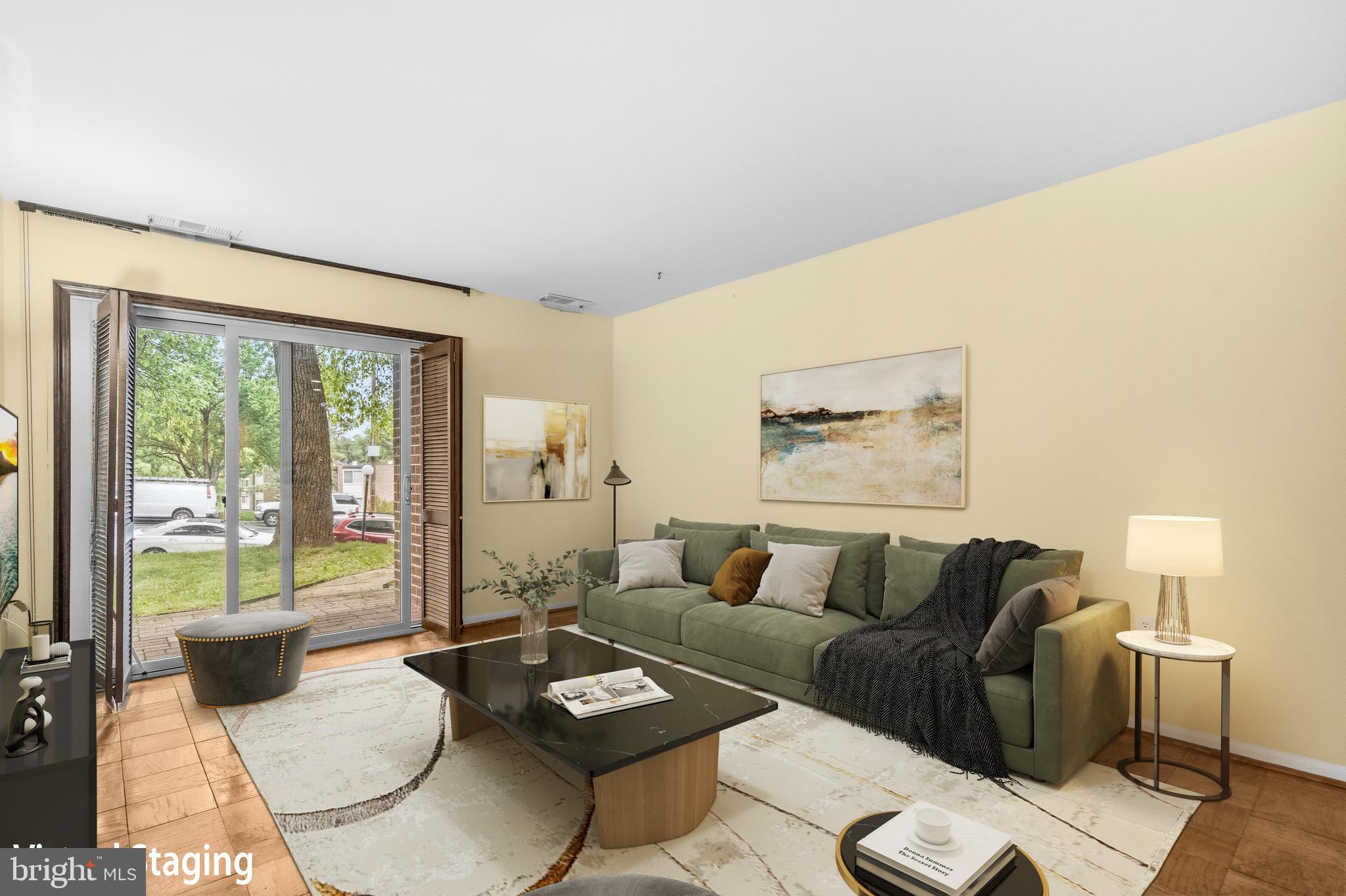 2305 Greenery Lane, Unit T23 Silver Spring, MD 20906 - Photo 8 of 40 a living room with furniture and a large window